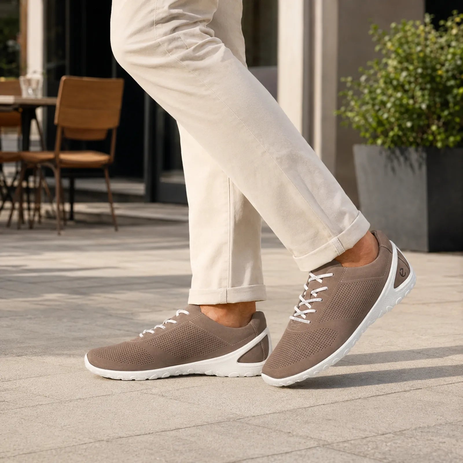 Men's tan lace-up sneakers with white midsole and perforated side panels