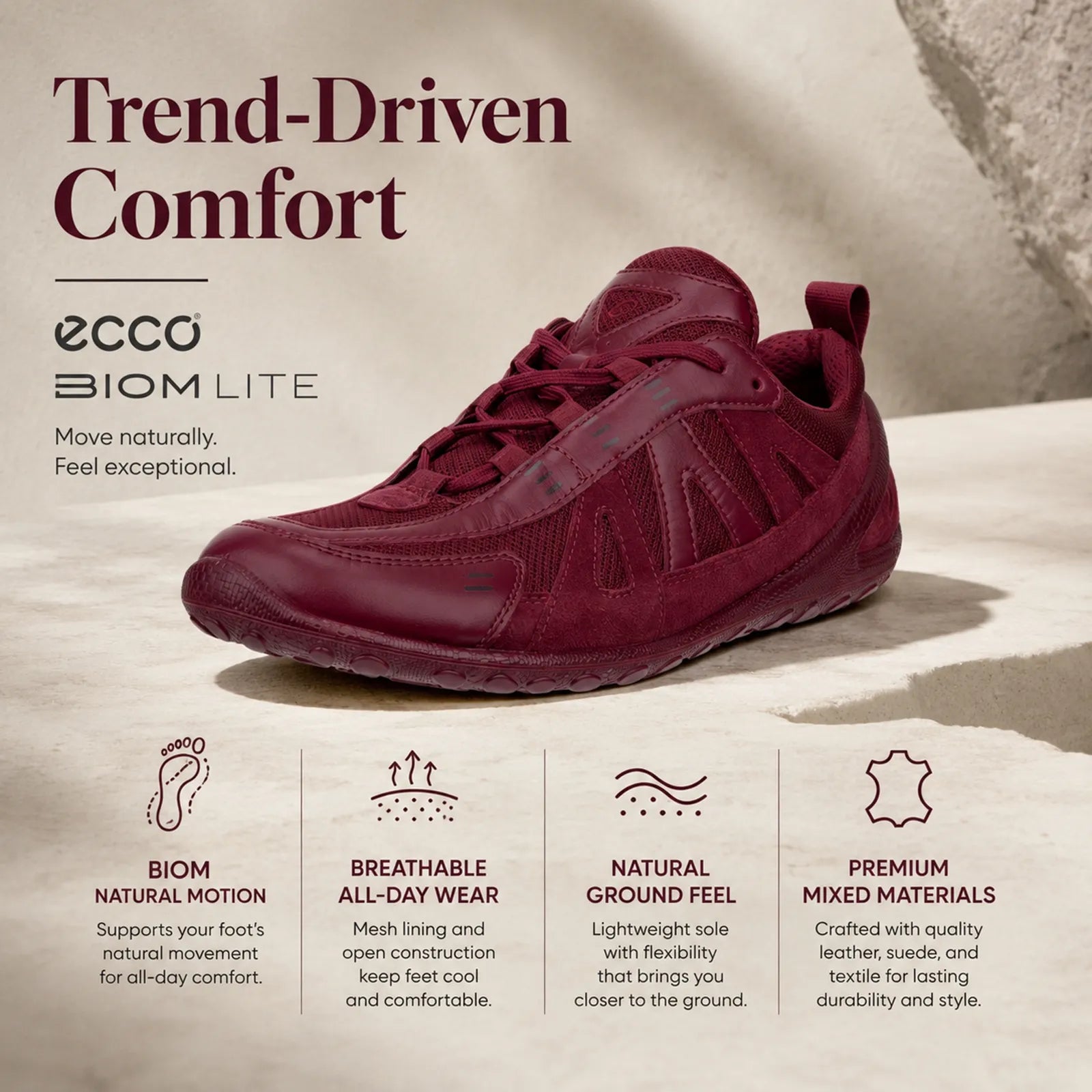 Burgundy women's lace-up sneaker with textured upper and cushioned flexible sole