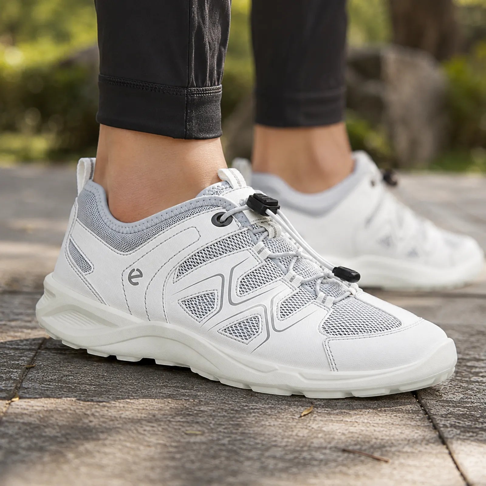 Women's light gray mesh sneakers with lace-up and thick tread sole