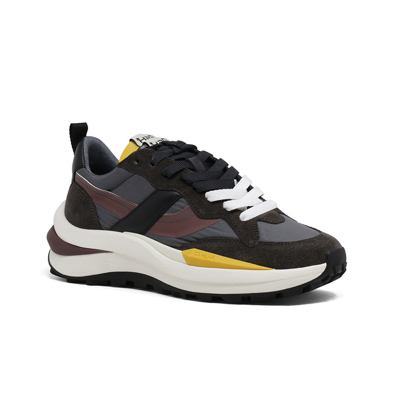 Women trainers in dark brown with burgundy and black accents, lace-up with chunky sole