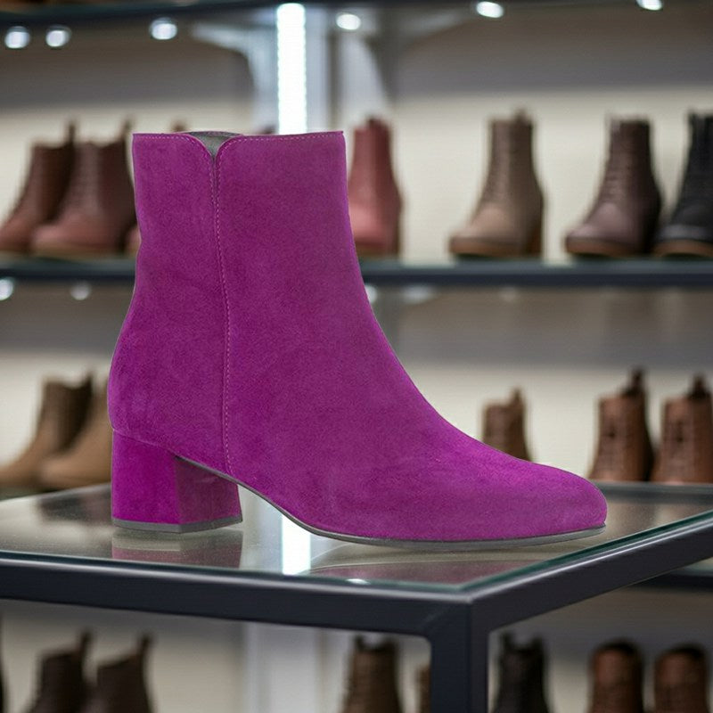 Women’s purple suede ankle boots with low block heel and side seam