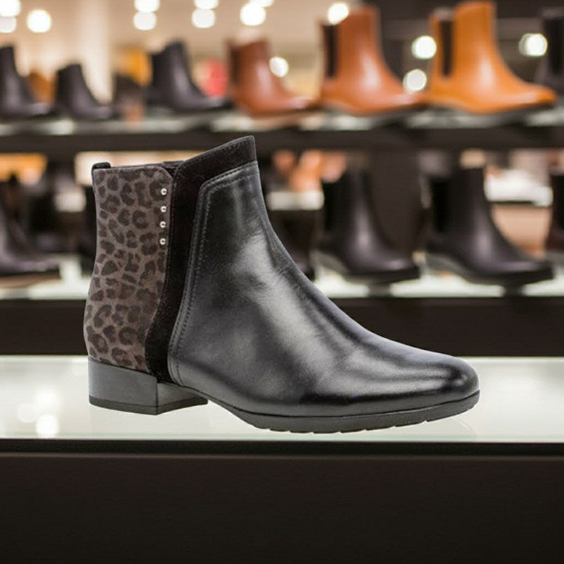 Black leather zip-up ankle boots with leopard side panel and low block heel