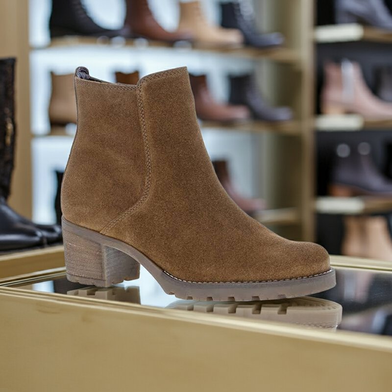 Brown suede ankle boots with elastic gore and treaded sole