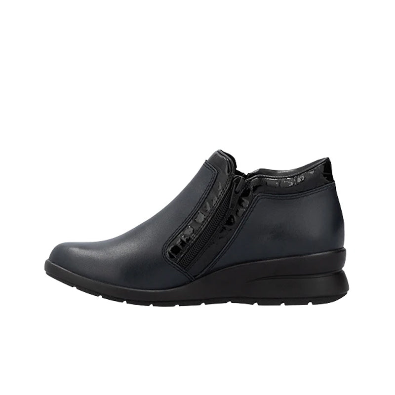 Dark blue Chelsea-style boots with side zipper and low sole