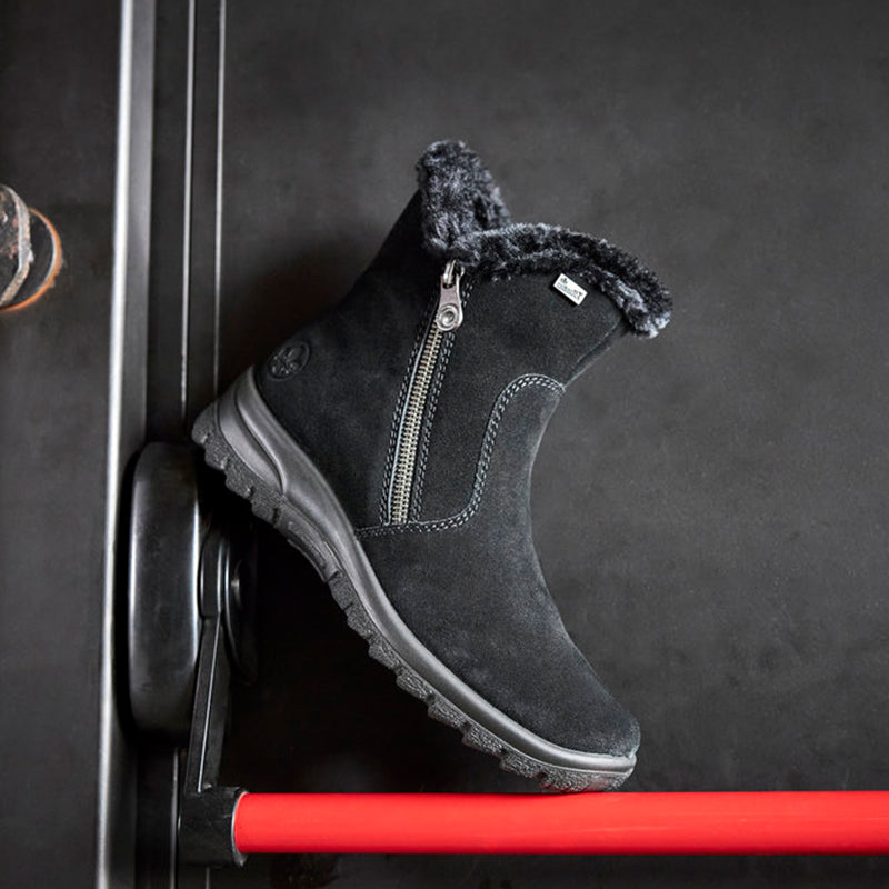 Black suede ankle boot with faux-fur lining, side zip, grippy platform sole