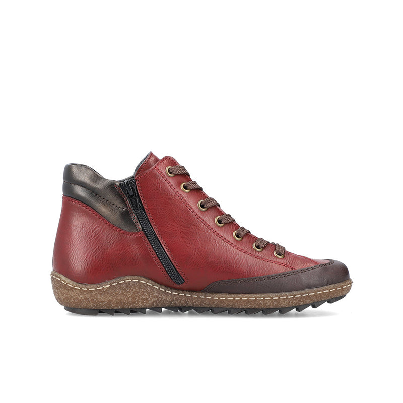 Red leather ankle boot with dark side panel, lace-up front, and rugged sole.