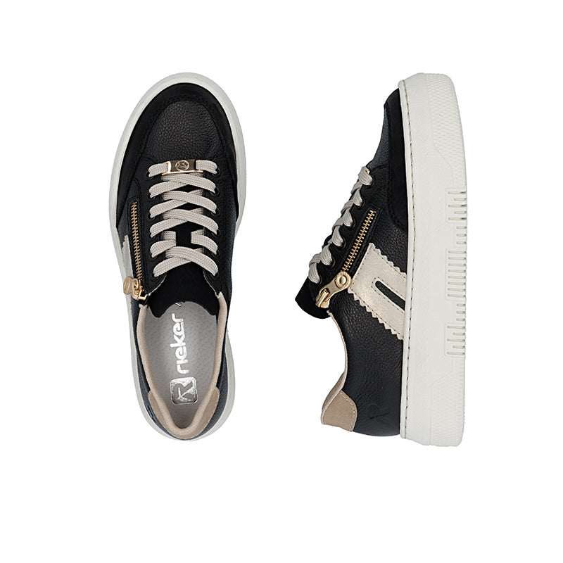 Low-top lace-up trainers pair, black upper with off-white outsole and gold zipper