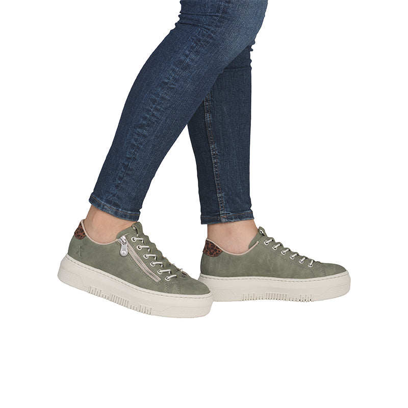 Olive green low-top sneakers with lace-up front and rubber sole