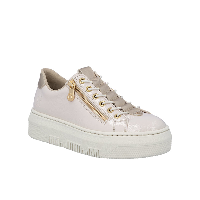 Beige and white low-top sneaker with gold zipper detail and lace-up front