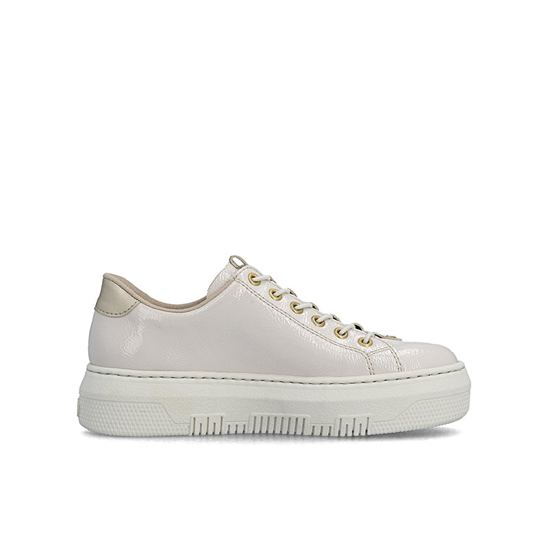 Beige low-top sneaker with lace-up front and textured light outsole