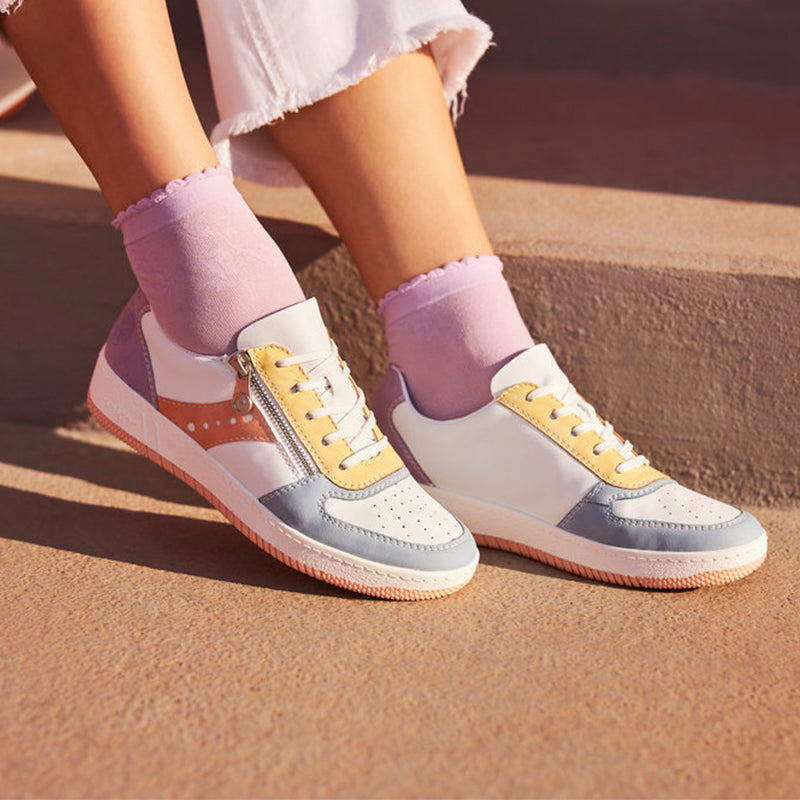 Womens multicolor sneakers shown on feet, lace-up and side zip