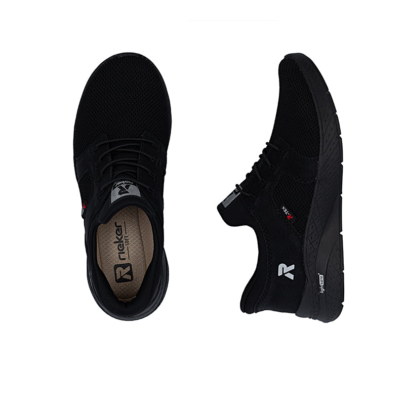 Women’s black lace-up sneakers, one showing treaded sole and side panel