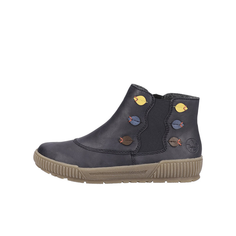 Women’s ankle boots in dark blue with colorful patch accents and ridged tan sole