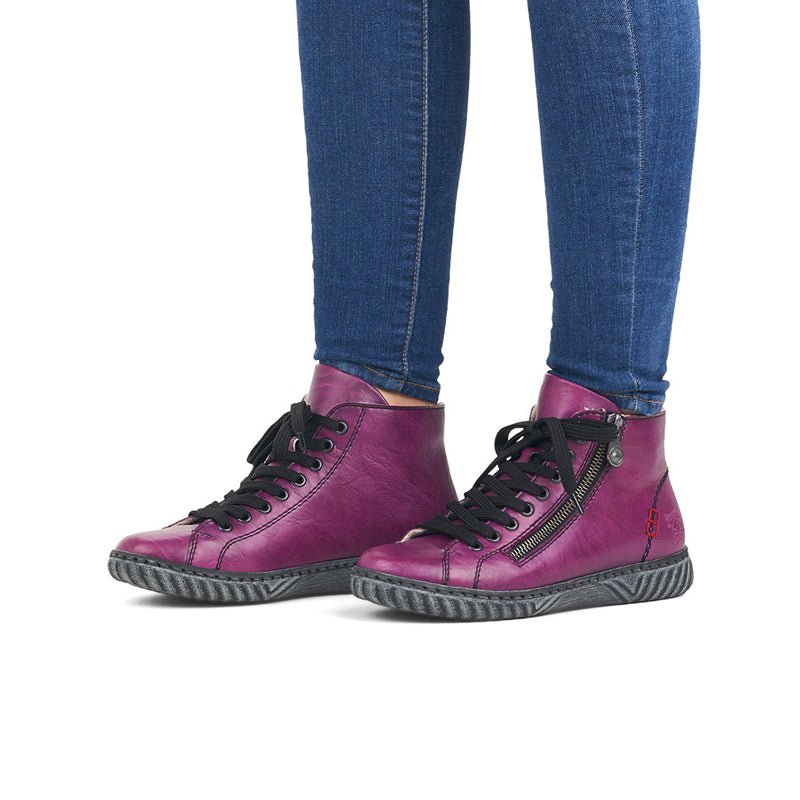 Purple ankle boots with lace-up front, side zipper, and textured rubber sole