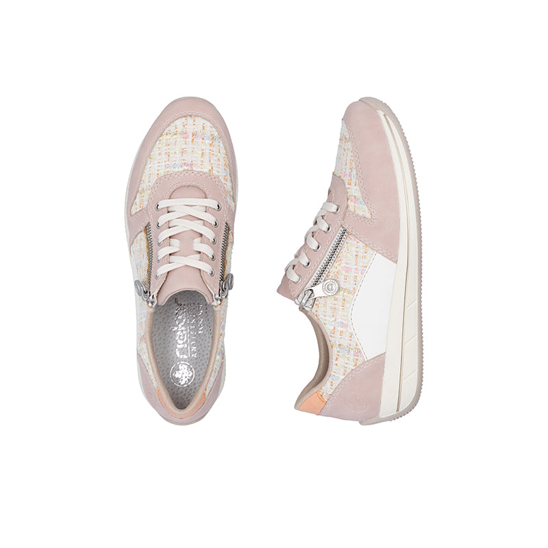 Pair of pink low-top sneakers with lace-up fronts and side zipper