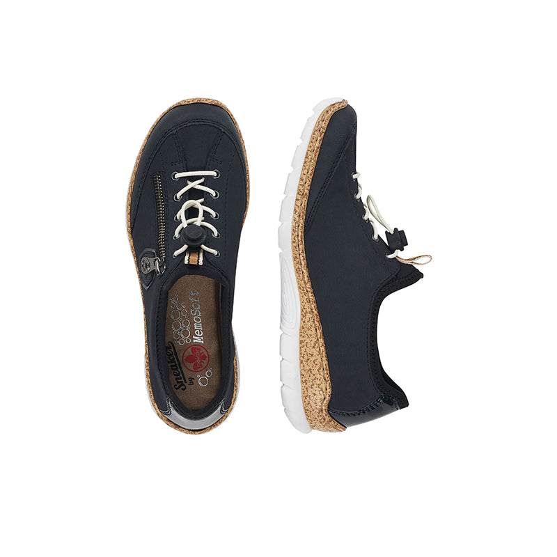 Pair of dark navy lace-up sneakers with side zipper detail and tan speckled sole