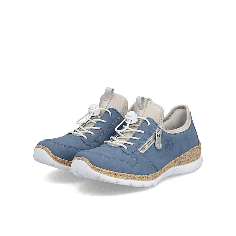 Blue-and-beige sneakers with lace-up design, padded collar, and cork-textured outsole