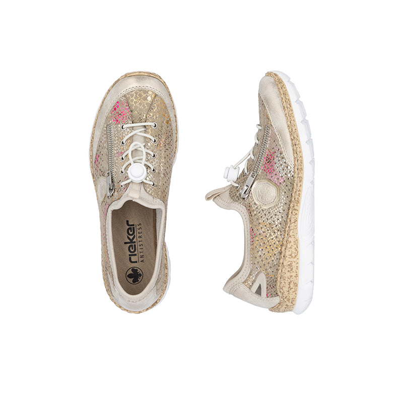 Beige glitter lace-up sneaker with padded collar and visible 'rieker' insole logo.