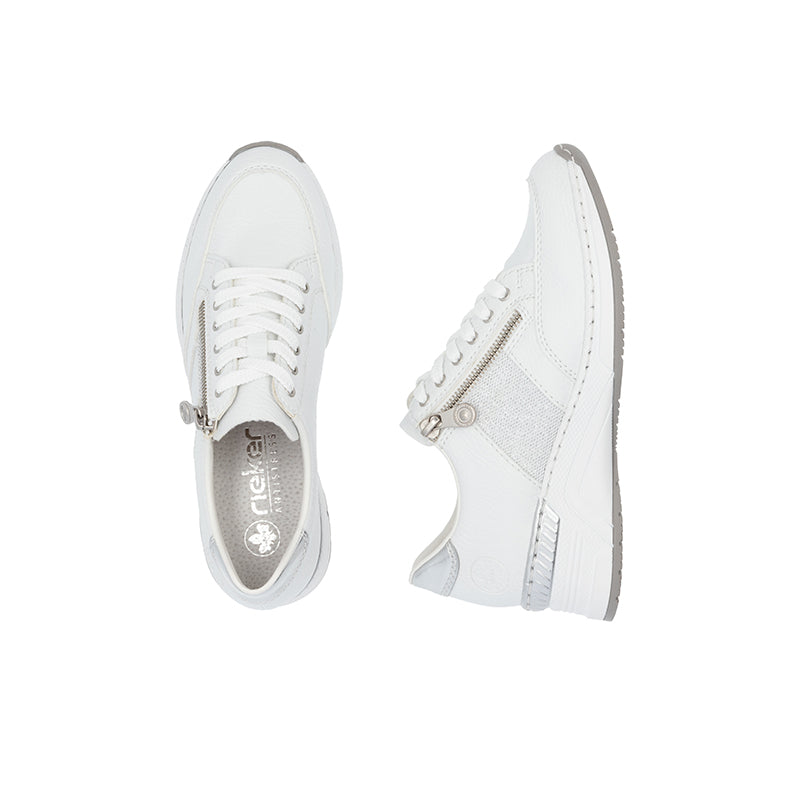 White leather sneakers showing lace-up top and side zipper opening.