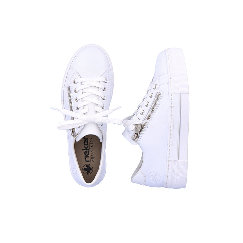 Pair of white women's lace-up sneakers with side zipper and cushioned tongue