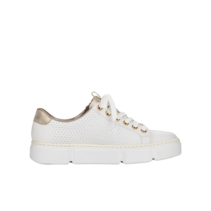 White low-top sneaker with gold lace eyelets, textured panels, and cushioned sole