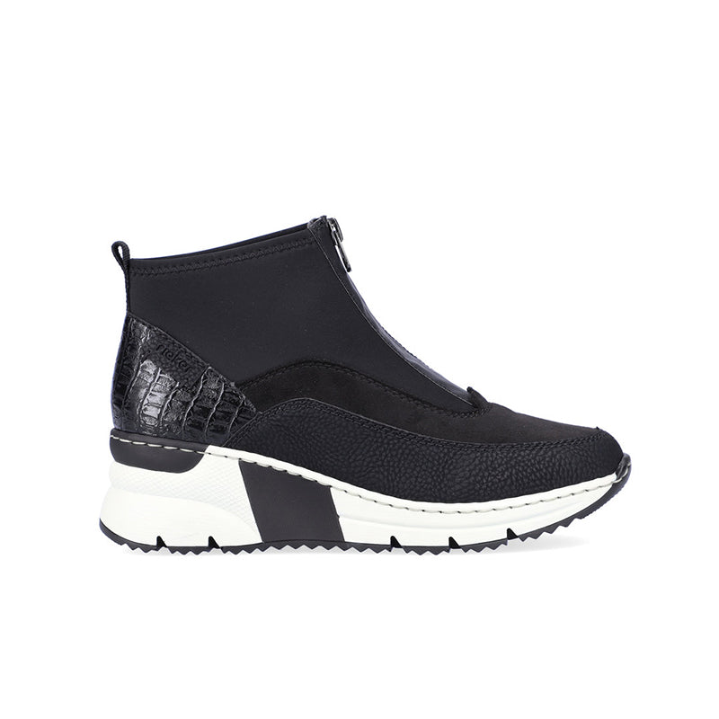 Black ankle boots with side zip, padded collar, and white chunky sole