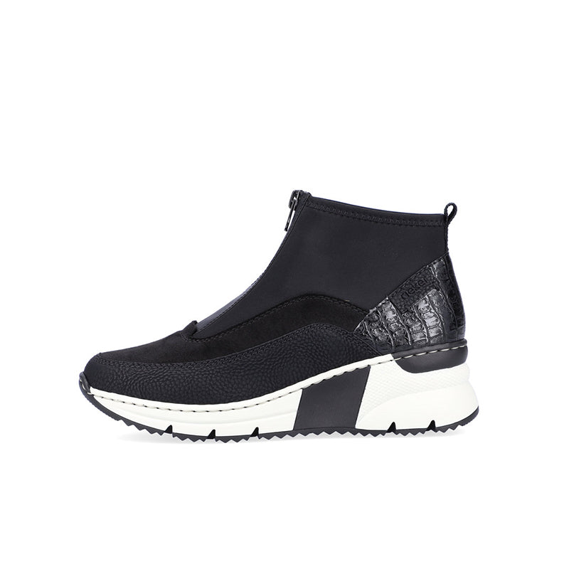 Black ankle boots with side zip, textured side patch, and white chunky sole