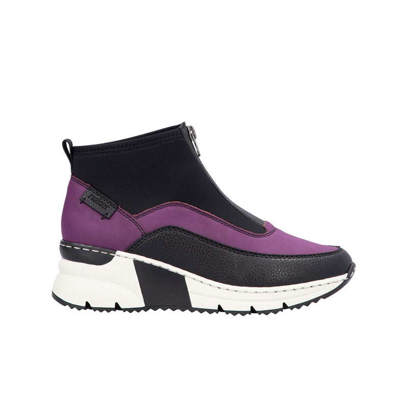 Purple ankle boots with side zip, contrast dark panel, and white chunky sole