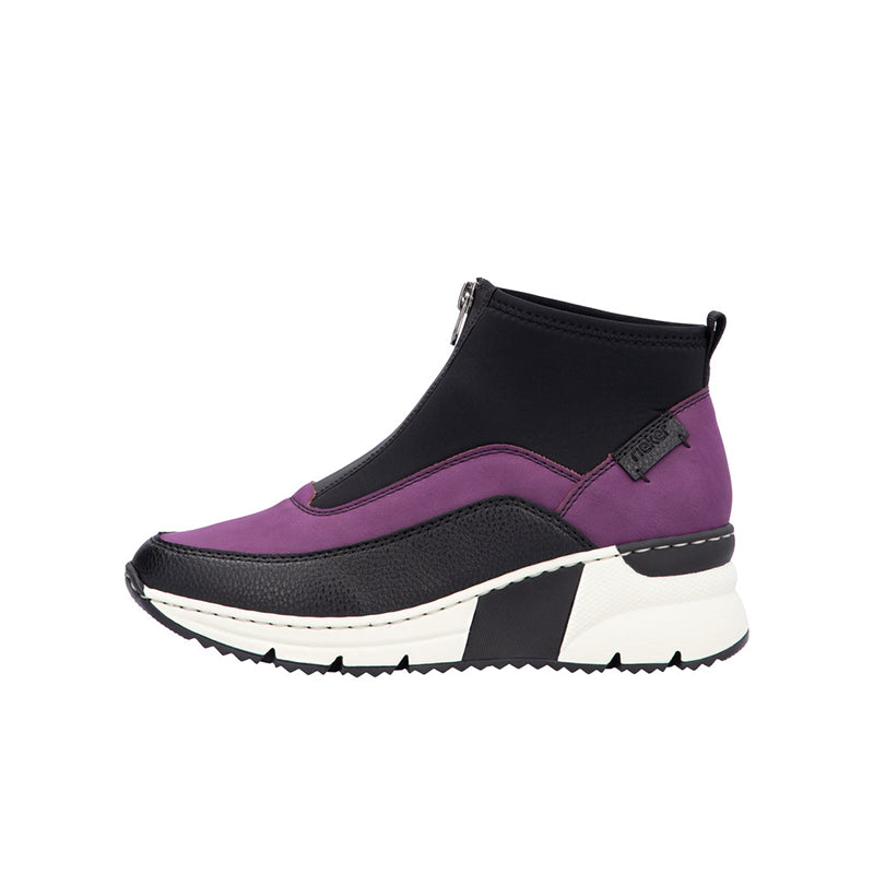 Purple ankle boots with side zip, contrast dark panel, and white chunky sole