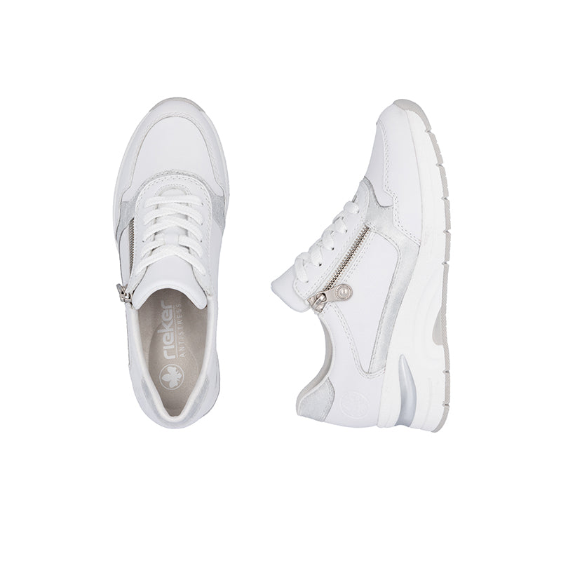 White women's fashion sneaker pair, lace-up front with side zip and molded sole