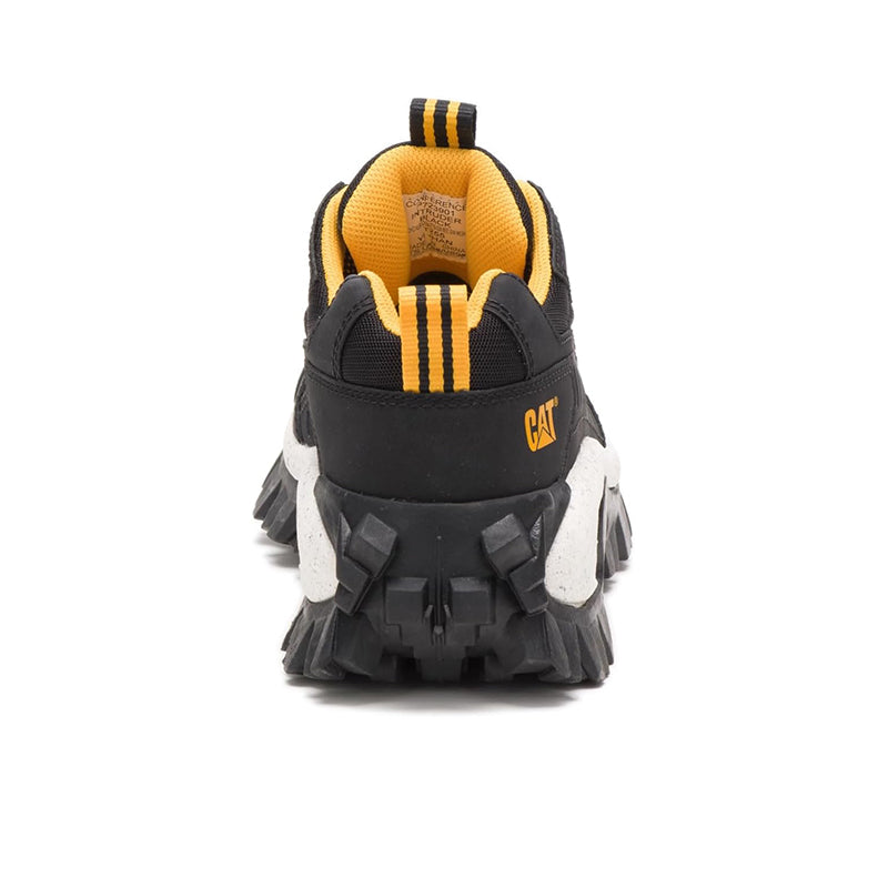 Black women’s sneakers with yellow-lined collar and rear pull tab