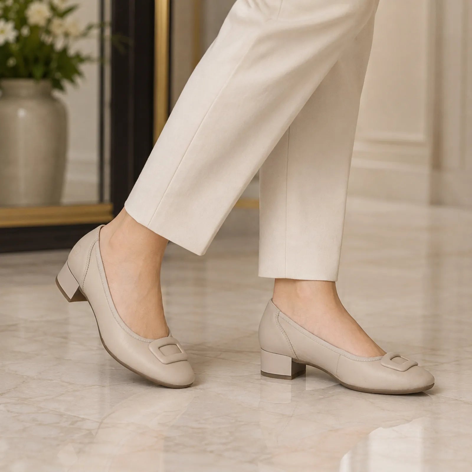 Beige leather pumps with square toe, low block heel, buckle strap