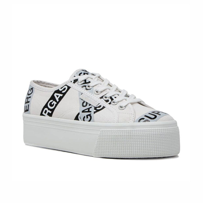 White canvas low-top sneakers with lace-up front and large RG A lettering tape panels