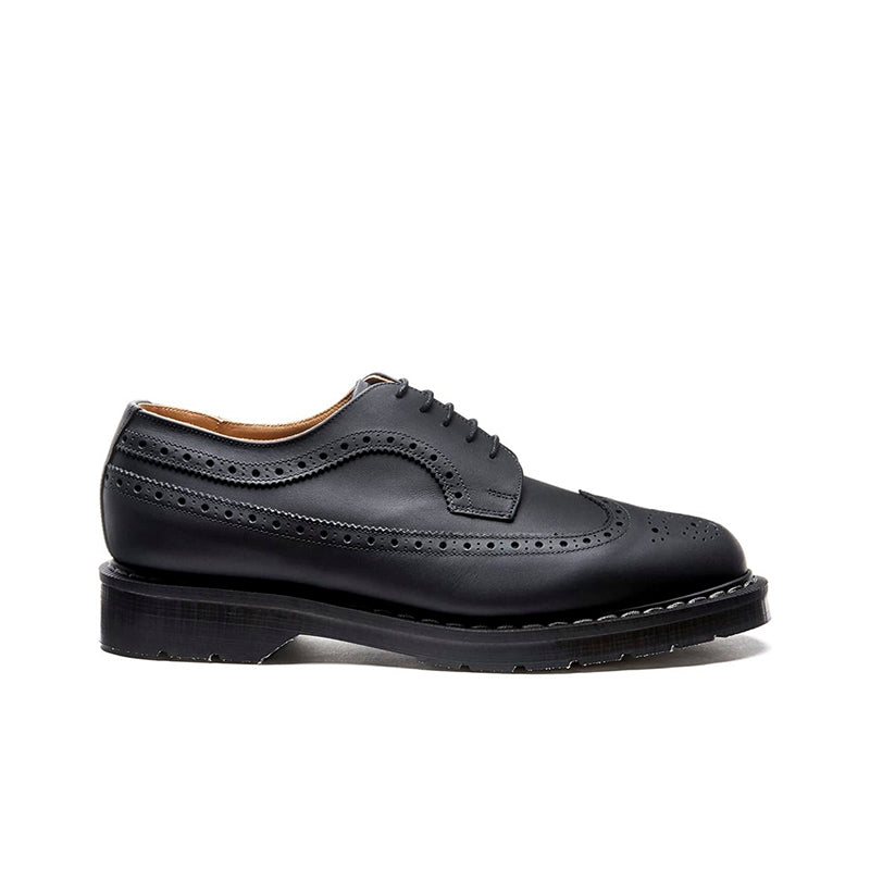Black leather 5-eye brogue lace-up shoes with perforated detailing and chunky sole