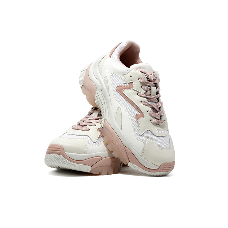 Women’s vanilla leather dad sneakers in side view with pink accents and padded collar