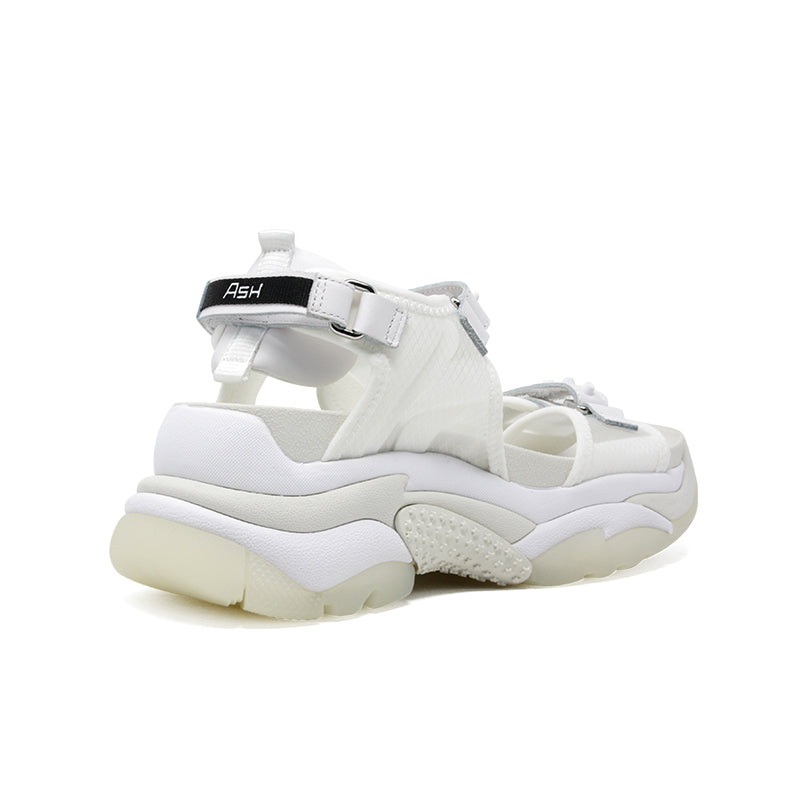 White casual platform sandals with toe cutouts and back logo strap
