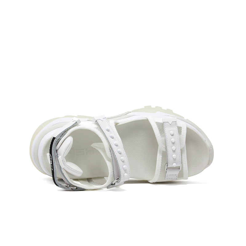 White casual platform sandals with side buckles and cushioned footbed