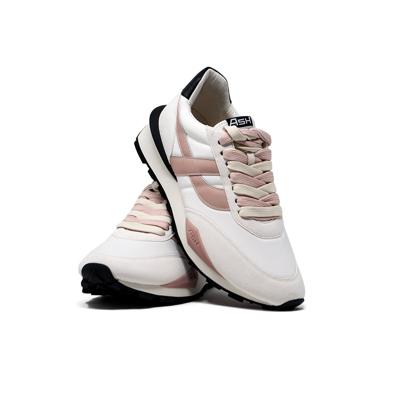 Women’s white sneakers with blush pink laces and side stripe, padded collar and heel