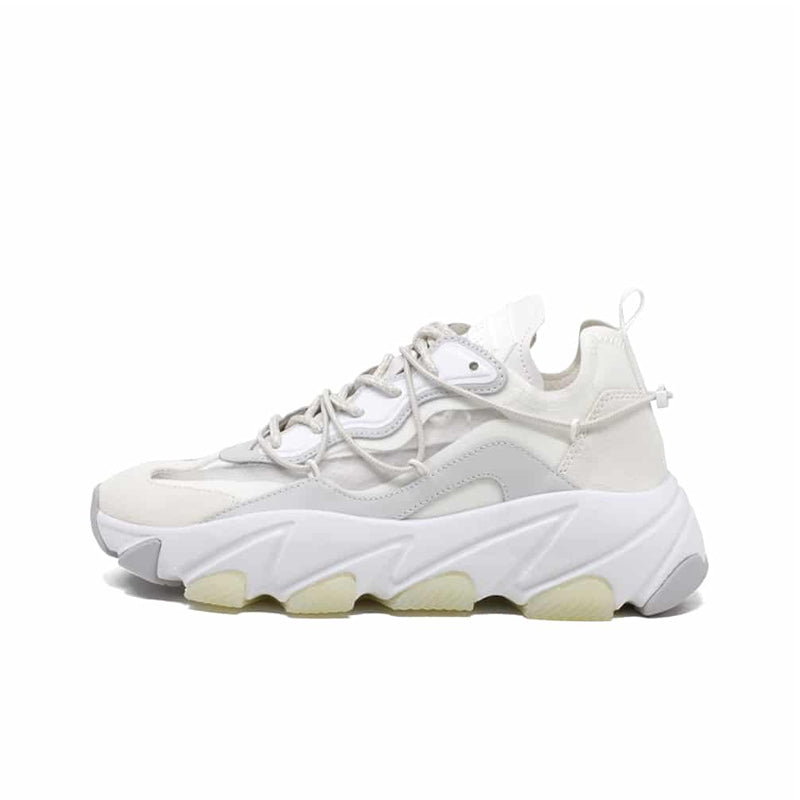 Women's white leather sneakers side view with lace-up and cushioned sole
