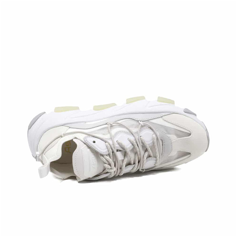 Women's white leather sneakers interior view with laces and padded collar