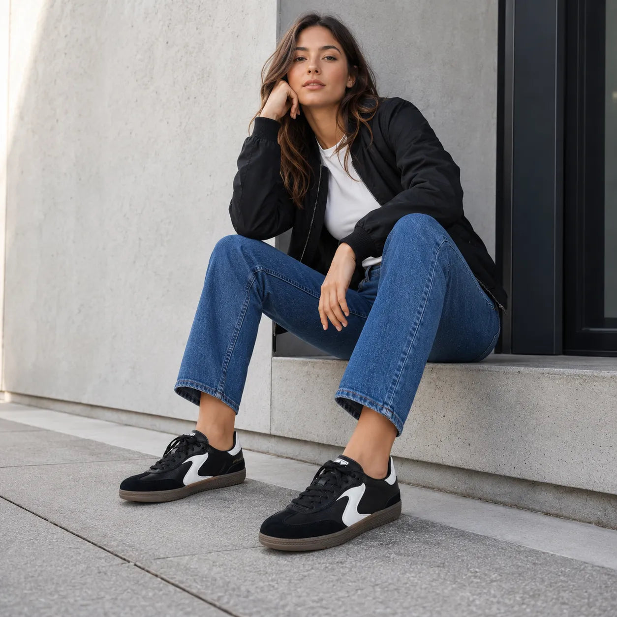Skechers women's sneakers black white Duraleather suede low-top court style 185232, on-foot view with outfit