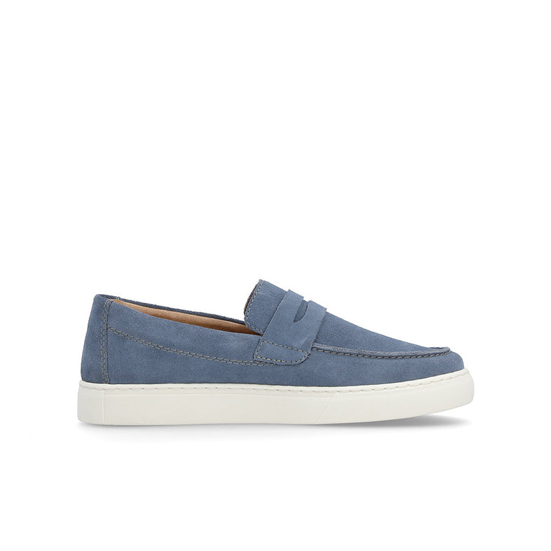 Blue suede slip-on loafers with bow strap and white rubber sole