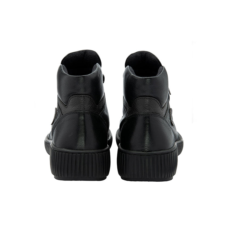 Black leather ankle boots back view with side zipper and ribbed cushioned sole.