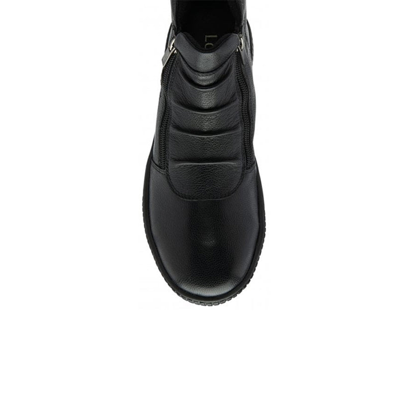 Black leather ankle boot upper close-up with side zipper and textured panel stitching.