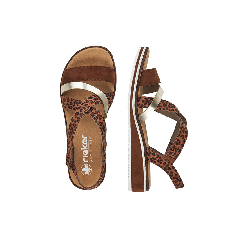 Brown leopard-print women's wedge sandals with white midsoles and silver cross straps