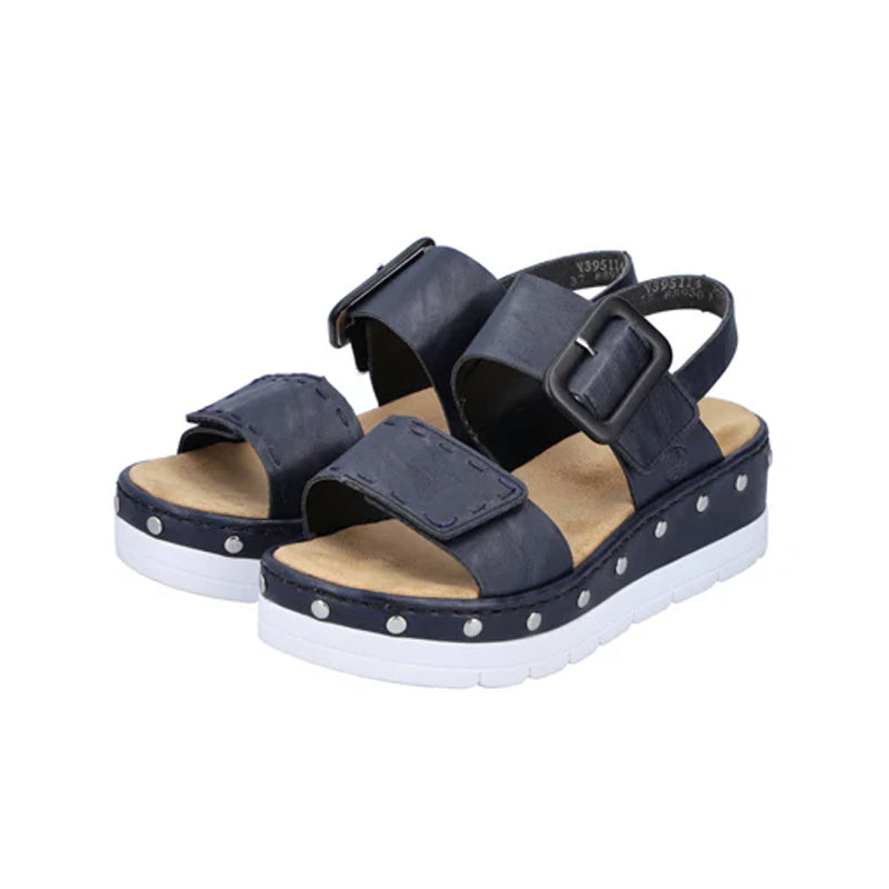 Navy platform sandals with three hook-and-loop straps and studded panels