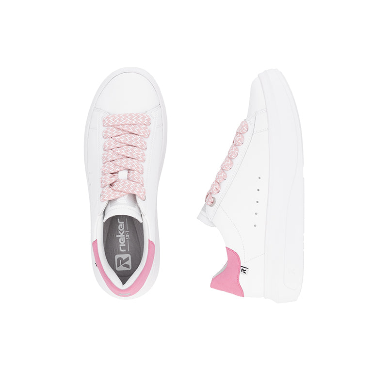 White sneakers with pink lace detail, pink heel tab, and low profile sole