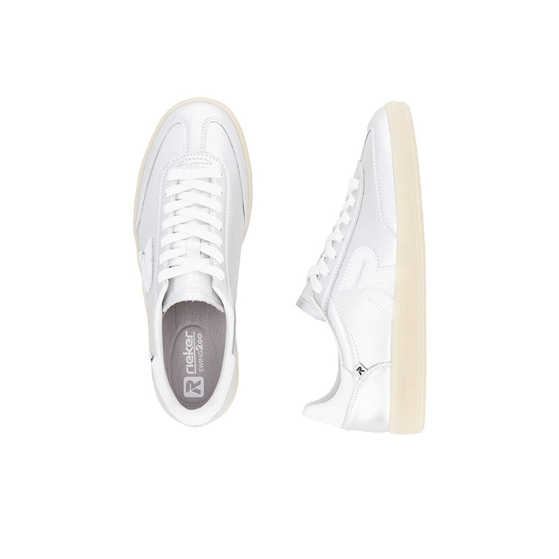 White lace-up leather women’s sneaker with gum sole, side view and tongue detail