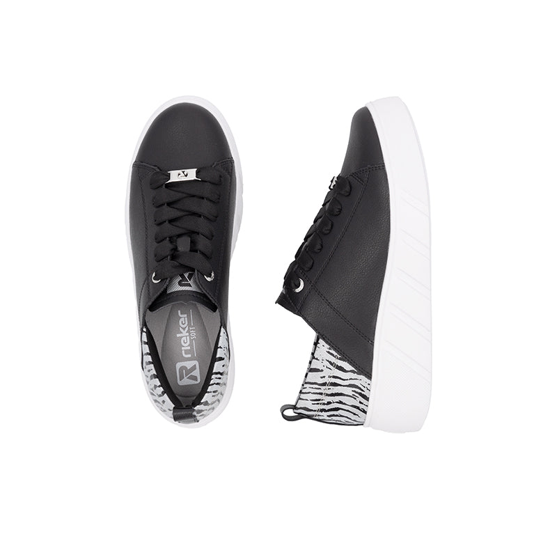 Black low-top lace-up sneaker pair with zebra side trim and white sole