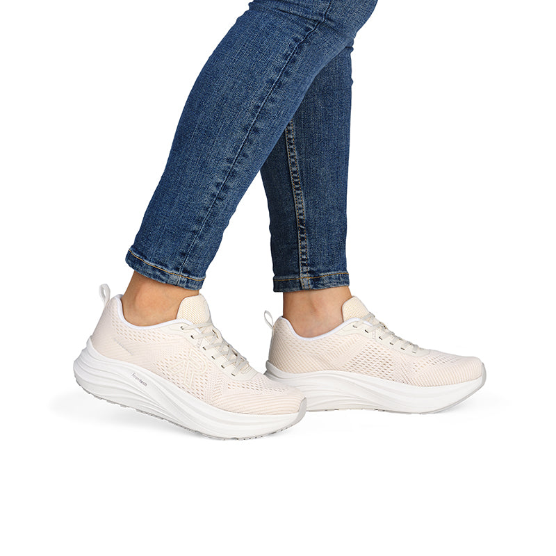 Beige knit lace-up sneaker with thick white midsole and side profile detail